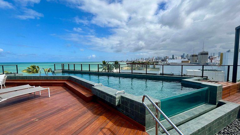 Flat c/ vista lateral mar pé na areia 503 Breeze