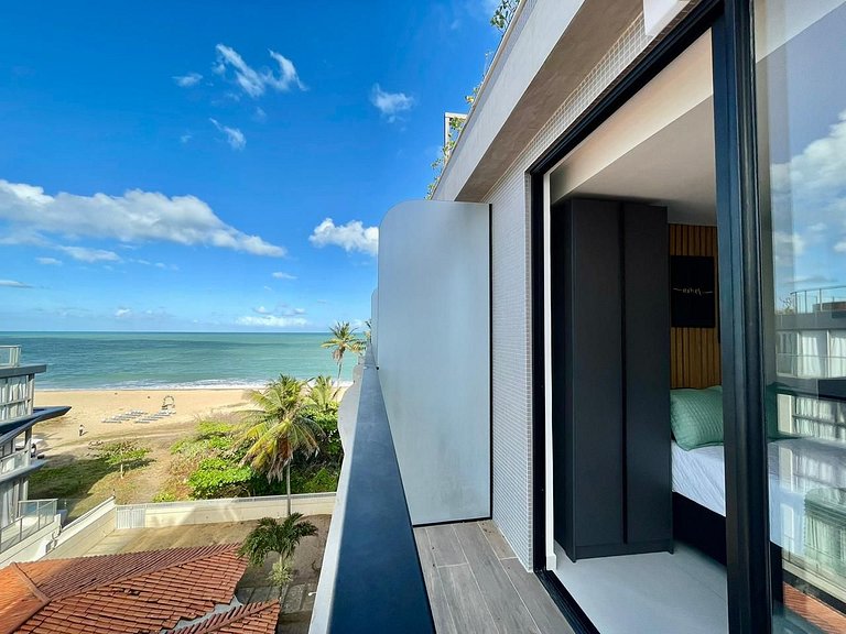 Flat c/ vista lateral mar pé na areia 503 Breeze